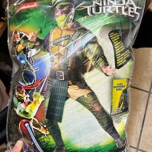 NINJA TURTLE DONATELLO MUSCLE JUMPSUIT ADULT COSTUME STANDARD FIT UP 44 Jacket